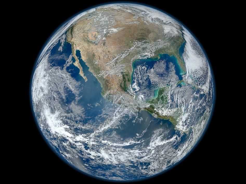 A view of Earth from space, showcasing continents, oceans, and cloud formations.